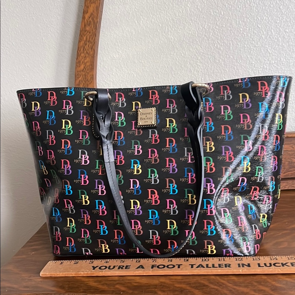 Dooney & Bourke Black and Pink Tote with Playful Pattern
